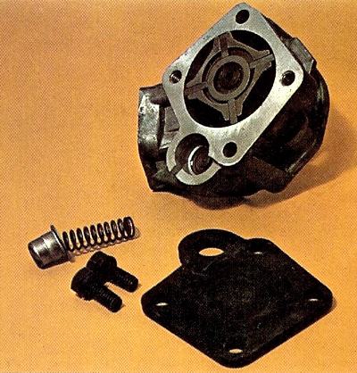 A partially dismantled vane-type oil pump