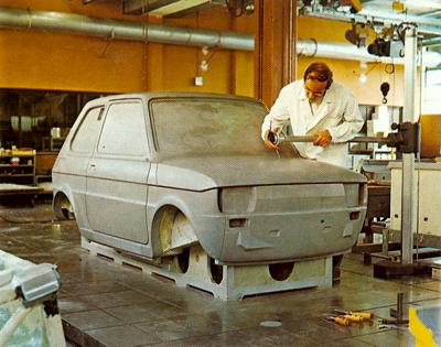 A full size model of a Fiat 126 The designer is taking the measurements of