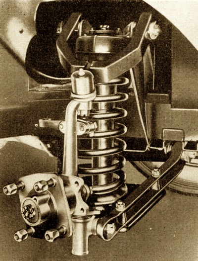 Close up view of Mayflower independent front coil suspension with rubber-bushed shackles