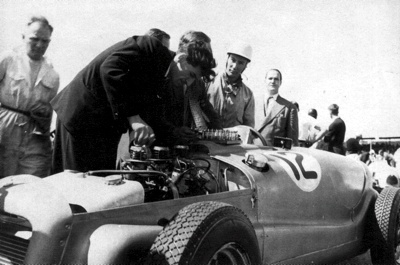 Stirling Moss assists with the preparation of his 1952 Bristol-engined ERA G-Type