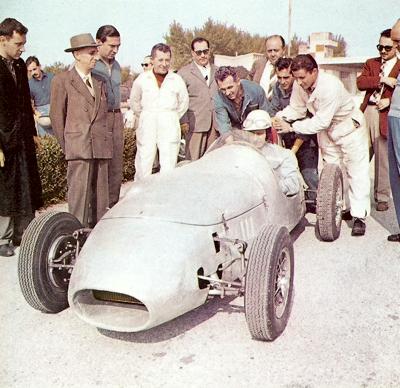 Fangio takes time out during his busy F1 schedule to test a Formula Junior Stanguellini at Modena in 1958