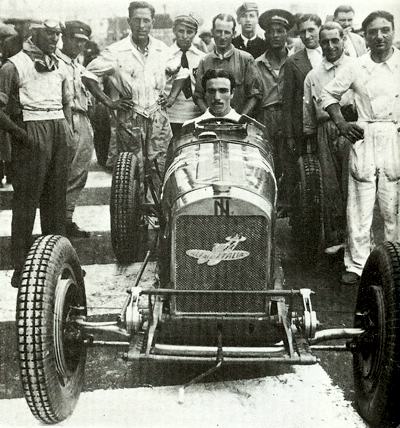 Nuvolari looking on as his mechanics roll out his modified Bugatti TN
