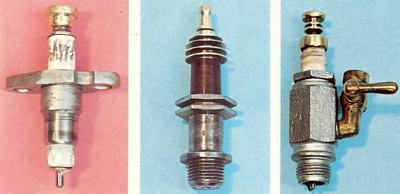 Left: The first plug, made by Lenoir in 1860. Centre: A Bosch racing plug with mica insulator circa 1970. Right: A Champion plug with priming tap, circa 1910
